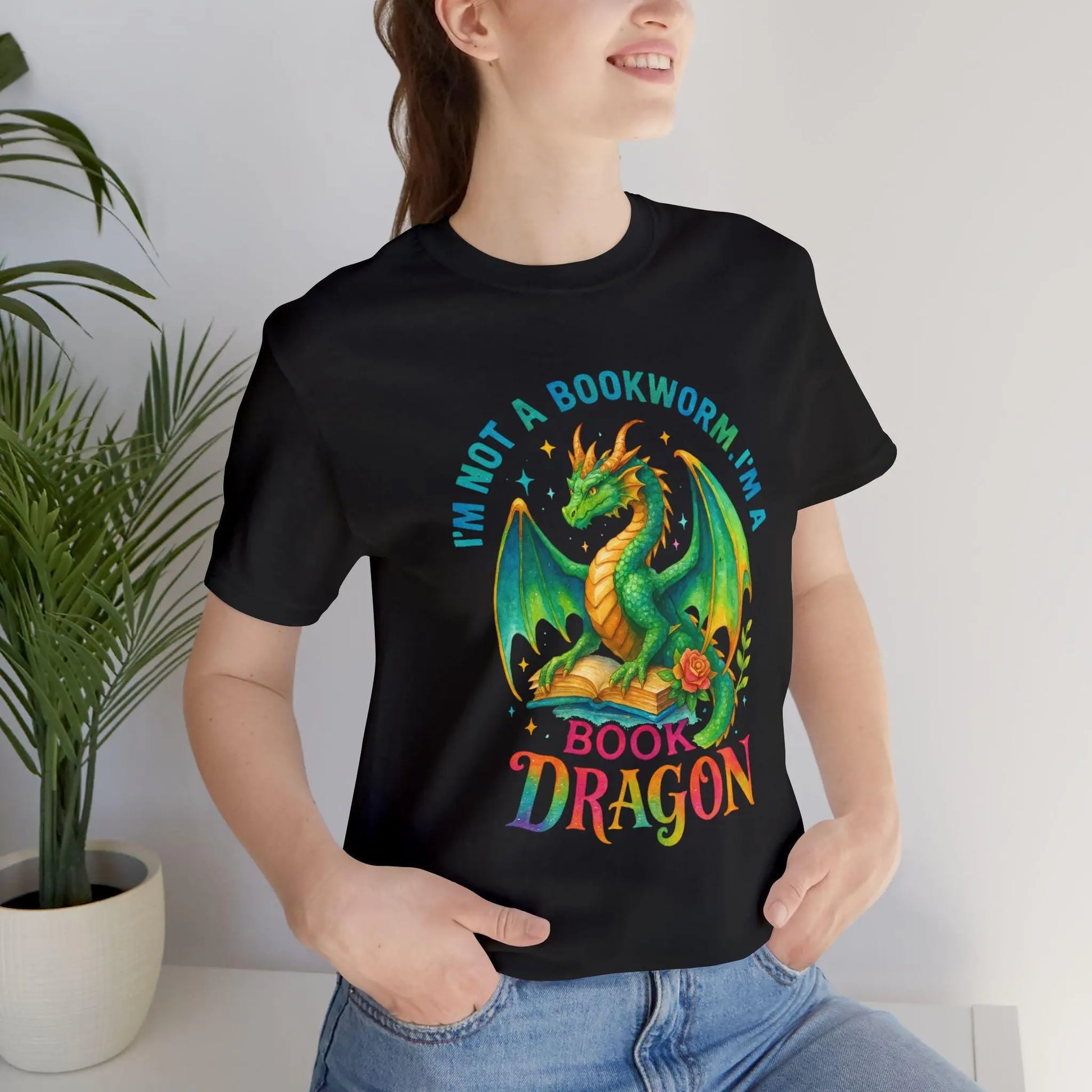 Book Dragon Graphic Tee: Literary Humor Shirt for Book Lovers Rainbow Chaos Art Studio